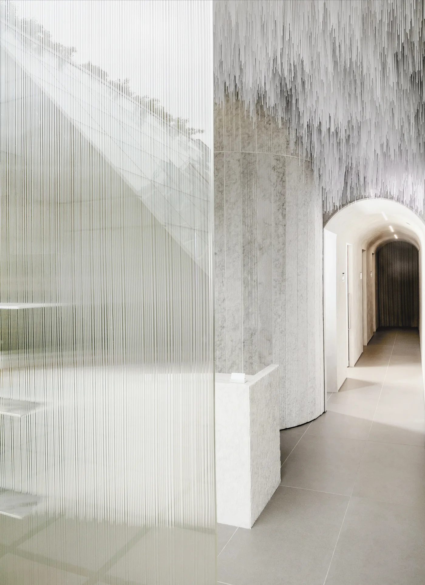 The arched corridor to the treatment rooms